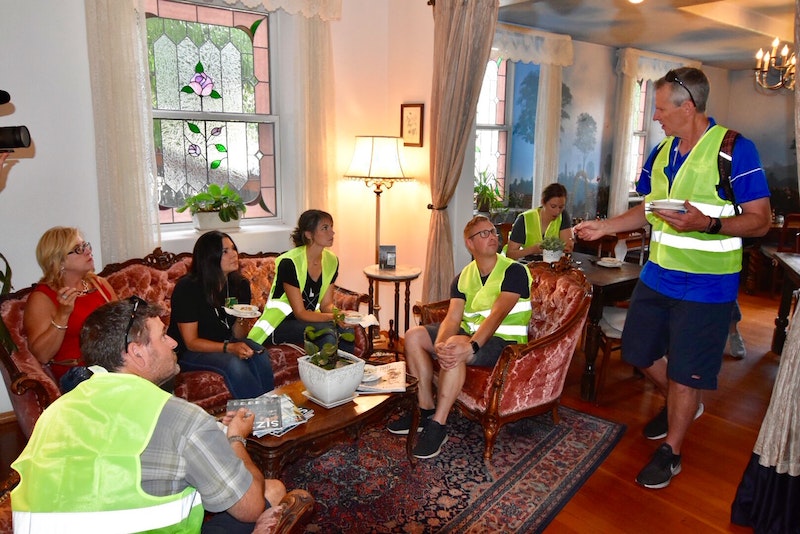 a group of people sitting at a table in a room